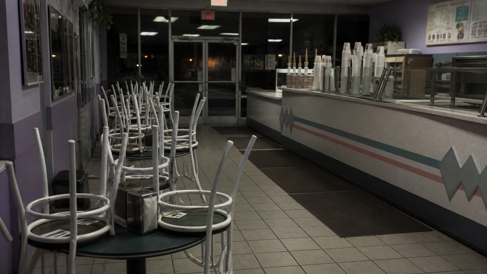 Empty 1990s frozen yogurt shop interior after closing, representing the night of the Austin Yogurt Shop Murders.