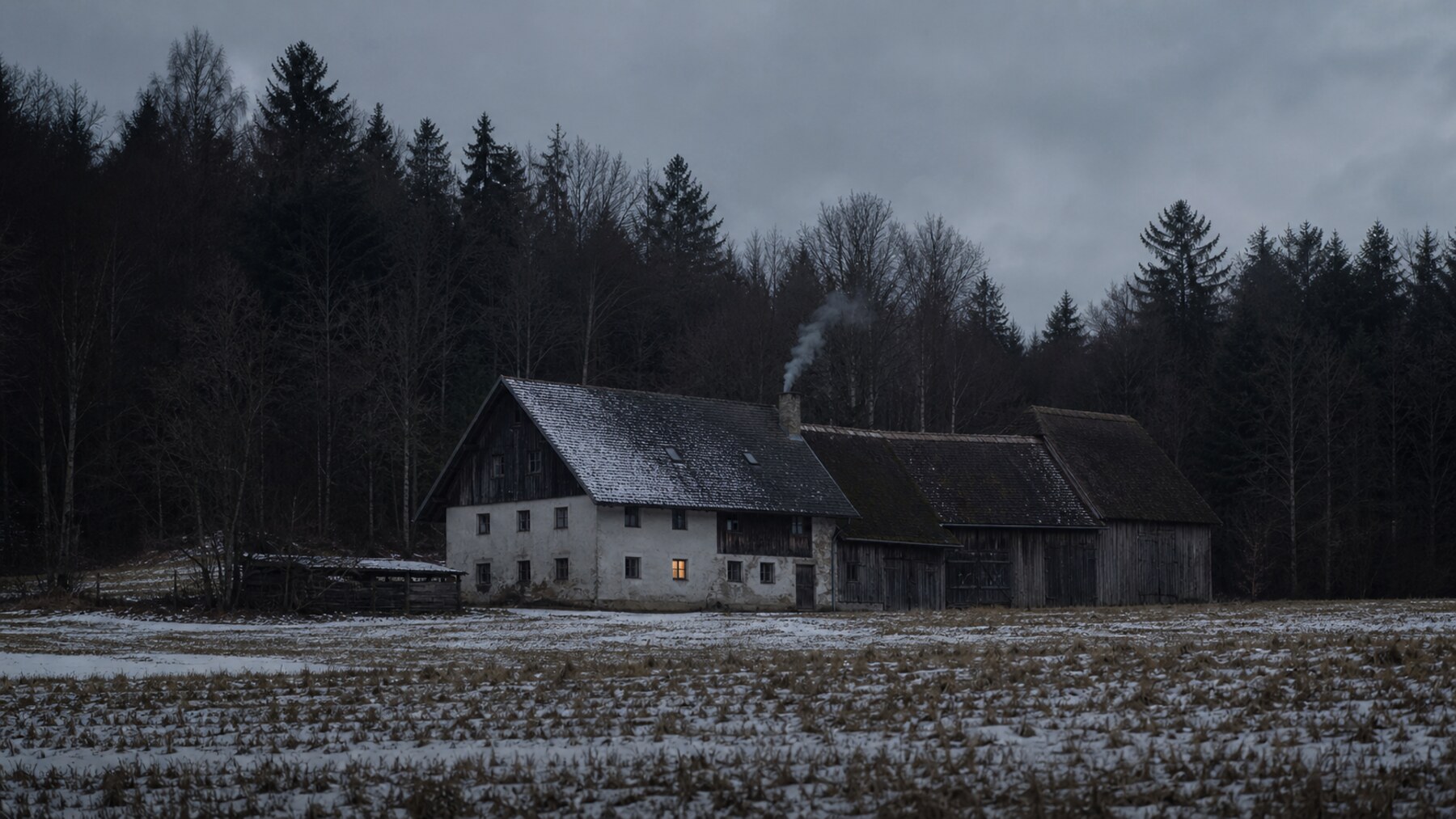 An isolated Bavarian farmstead behind winter woods recreates the rural setting of Hinterkaifeck.