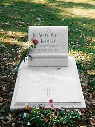 Creative Commons photograph of JonBenét Ramsey’s grave used as respectful memorial context.