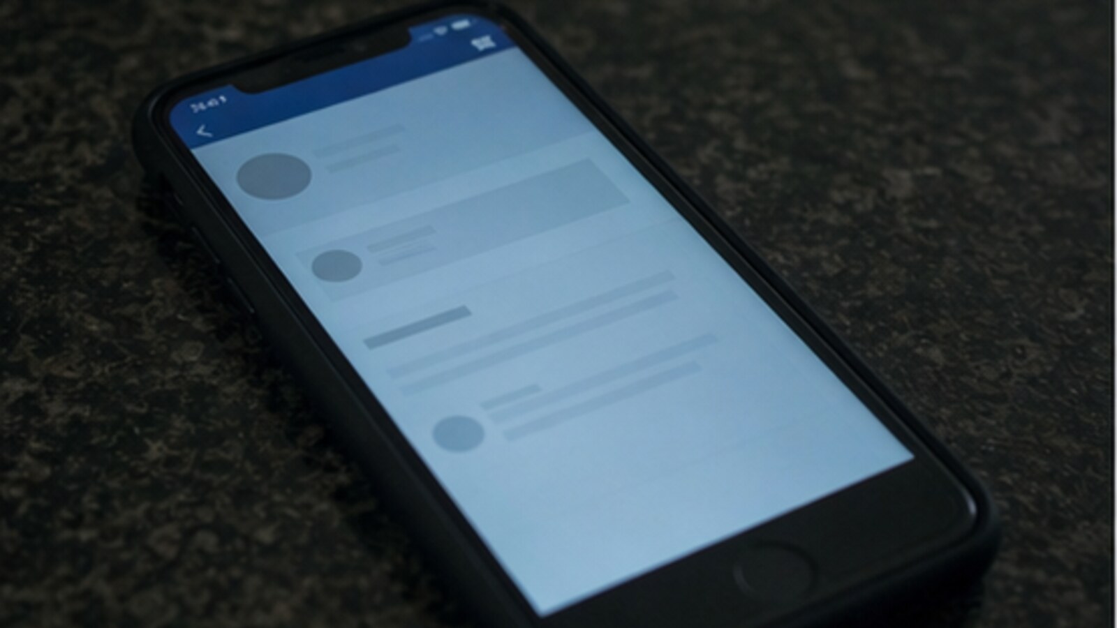 A glowing smartphone with an unreadable professional-networking interface, representing the digital leads reviewed after Missy Bevers' murder.