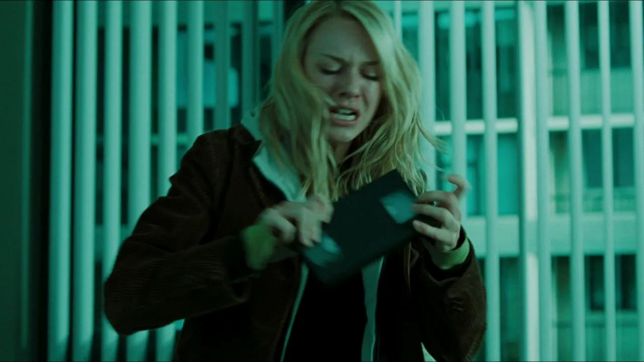 Rachel Keller holds the cursed VHS tape while confronting the copy-or-die rule in The Ring.