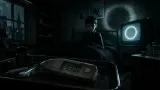 A digital thermometer reading 93.0 F sits before a pale boy and a glowing CRT television in a dark bedroom.