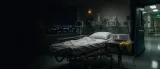 Empty 1994 emergency room with a gurney, oxygen mask, protected blood samples, and hazmat gloves