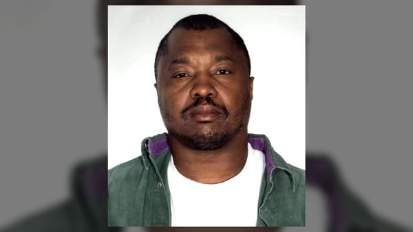 Lonnie David Franklin Jr. in a real mugshot, the Grim Sleeper identified through familial DNA.