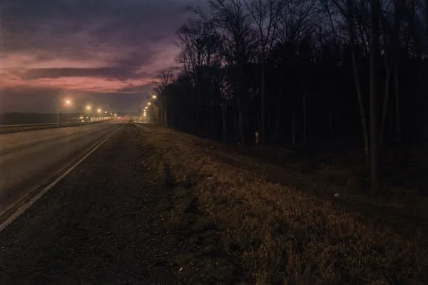 A lonely 1970s highway embankment near Washington, D.C., representing the Freeway Phantom murders.